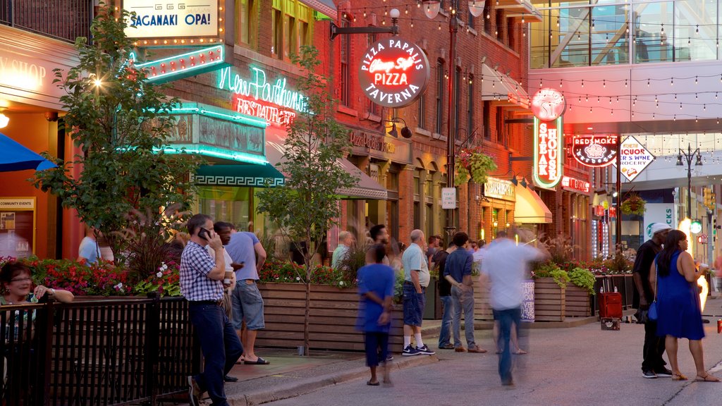 Greektown Historic District which includes signage as well as a small group of people