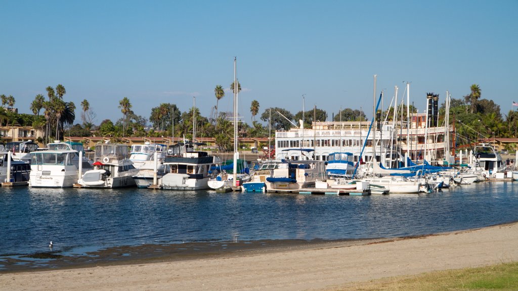 Mission Beach showing a sandy beach, a marina and boating