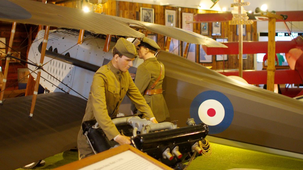 San Diego Air and Space Museum showing military items, interior views and aircraft