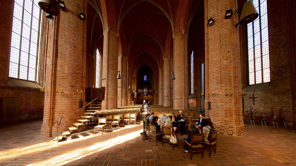 Marktkirche featuring a church or cathedral, heritage elements and interior views