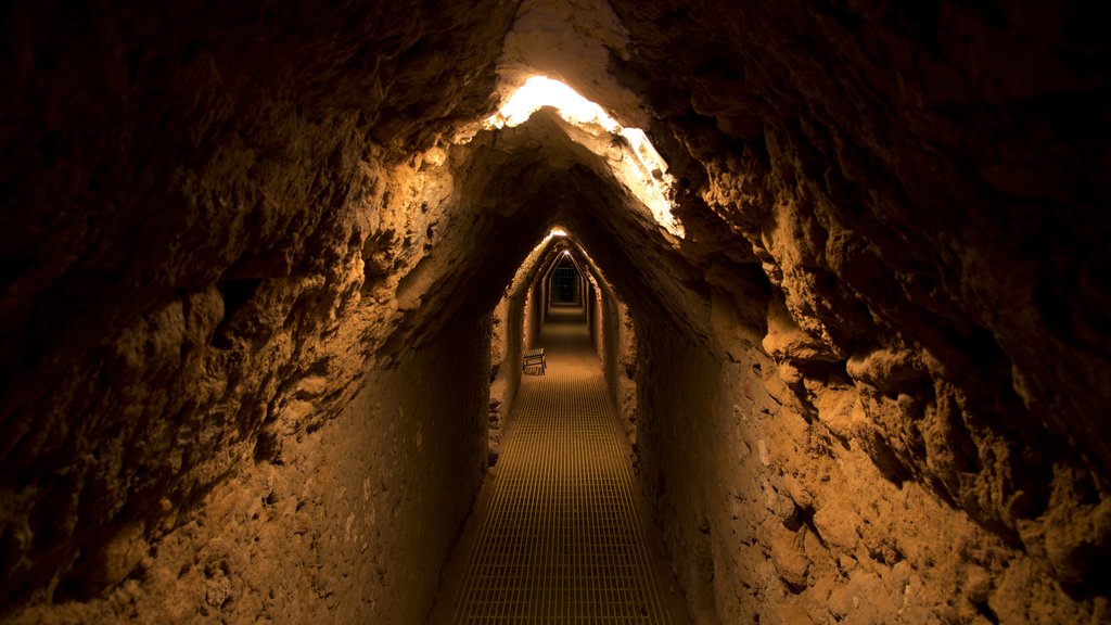 Great Pyramid of Cholula which includes heritage elements and interior views