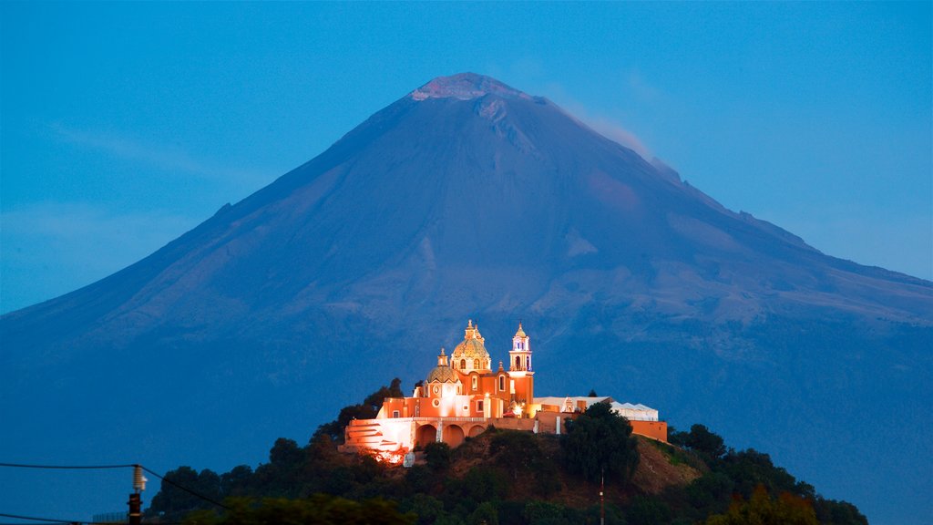 La Virgen de los Remedios Sanctuary which includes heritage elements and mountains