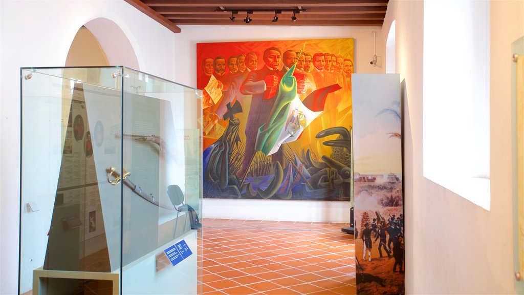 Fort Loreto featuring art, heritage elements and interior views