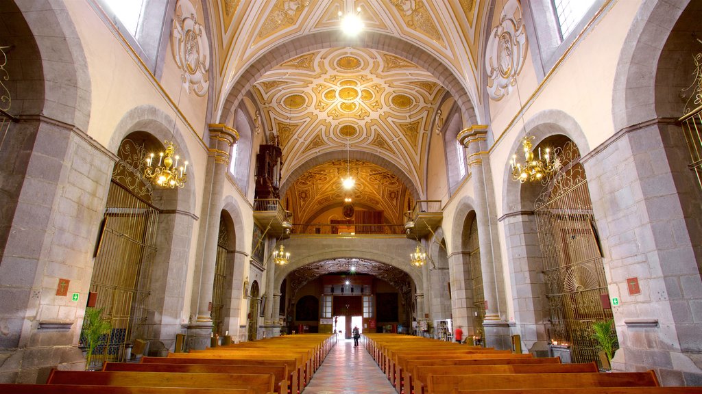 Santo Domingo Church showing a church or cathedral, heritage elements and interior views