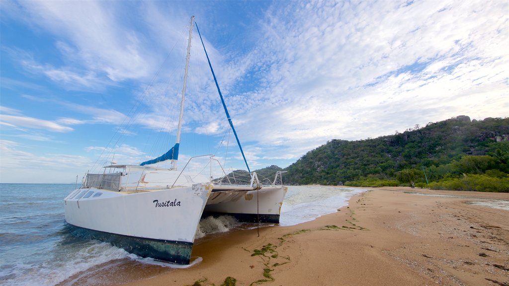 Horseshoe Bay Beach which includes general coastal views, boating and a sandy beach