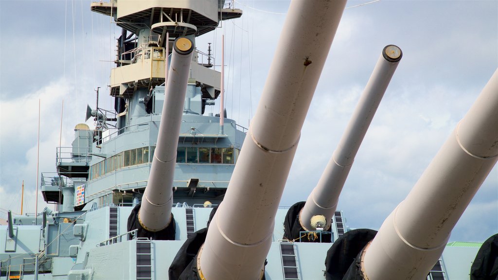 USS Wisconsin BB-64 showing military items and a bay or harbor