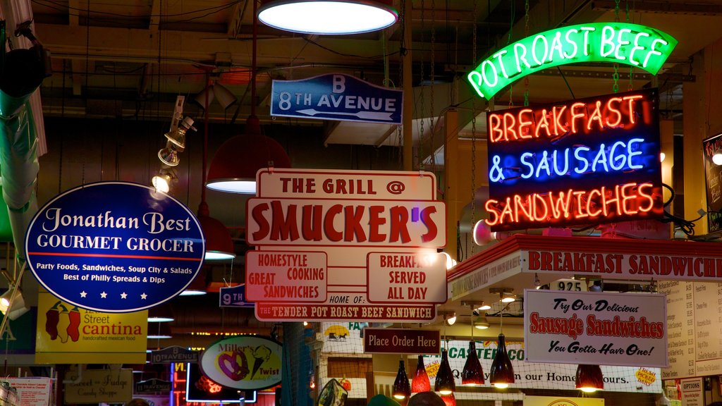 Reading Terminal Market showing night scenes, a city and interior views