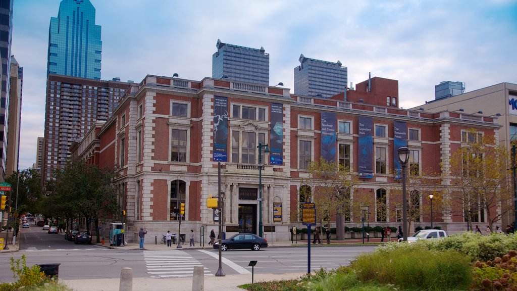 Academia de Ciências Naturais caracterizando uma cidade, um edifício e cenas de rua