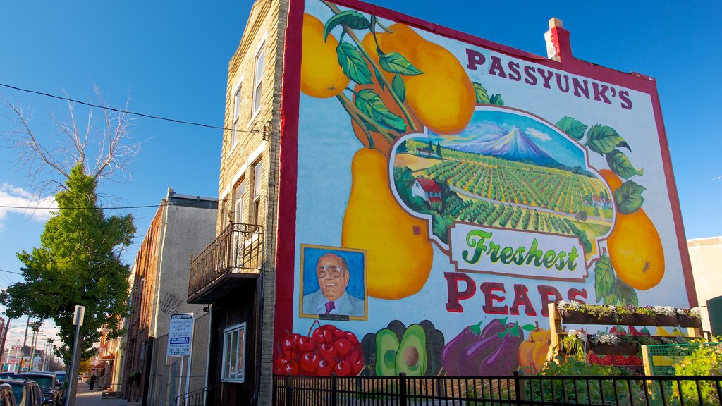 Italian Market showing art, a city and signage