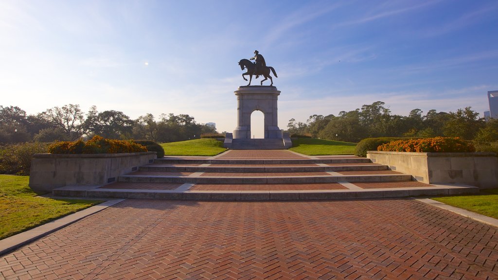 Hermann Park which includes a park, a monument and a statue or sculpture