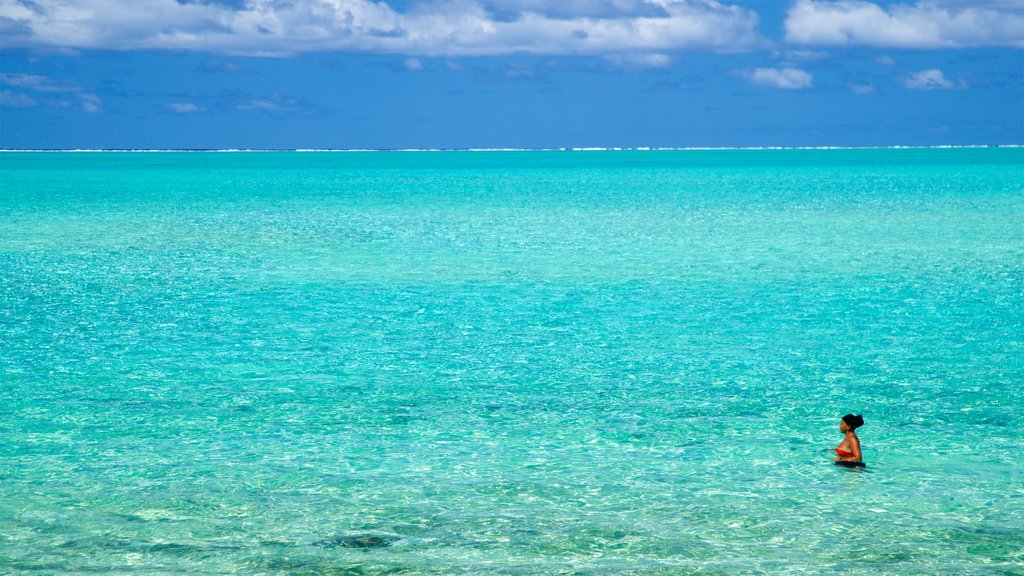 Matira Beach showing general coastal views, tropical scenes and swimming