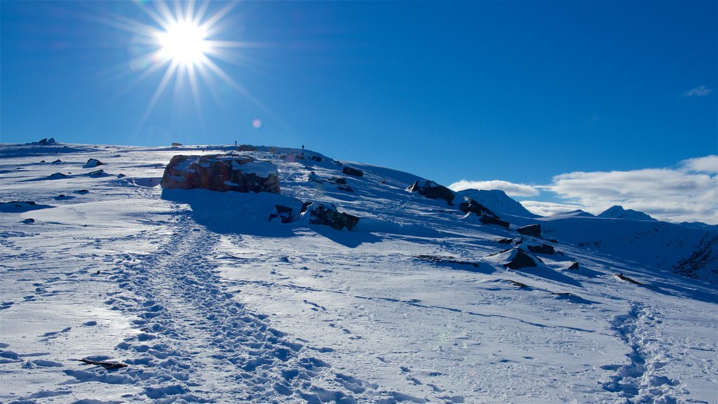 Jasper Tramway showing snow, mountains and a sunset