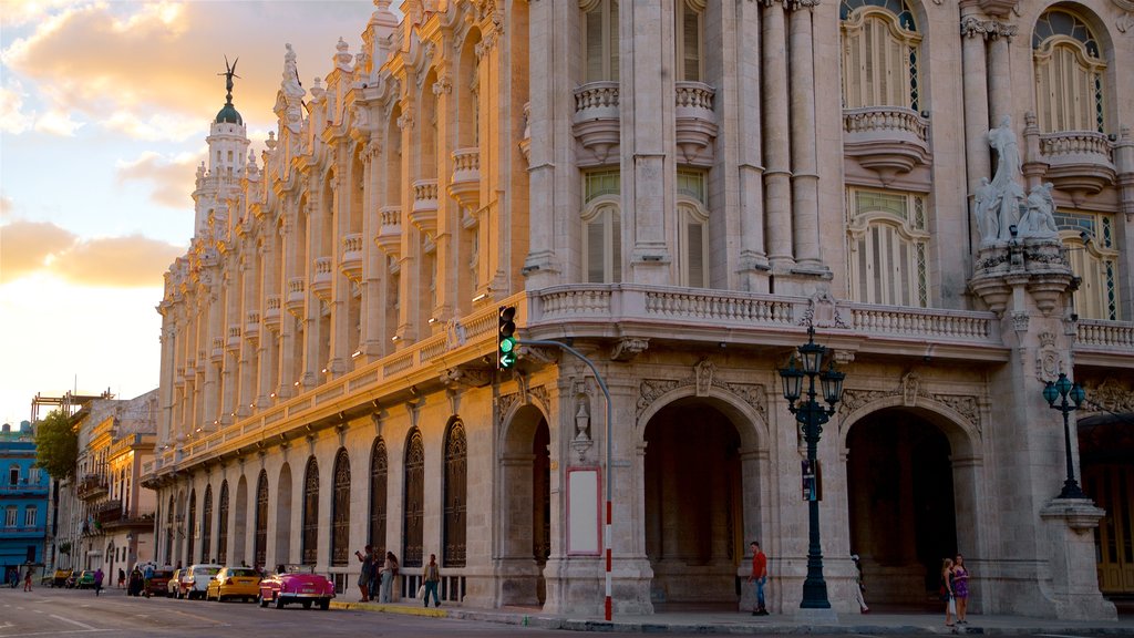 La Habana Grand Theater which includes a sunset and heritage architecture