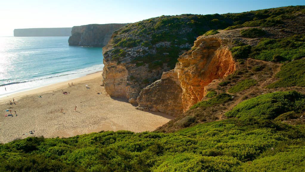 Beliche Beach which includes rugged coastline, a beach and general coastal views