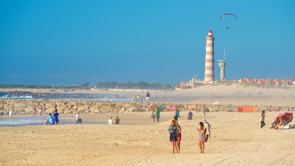 Costa Nova Beach showing a lighthouse, a beach and general coastal views