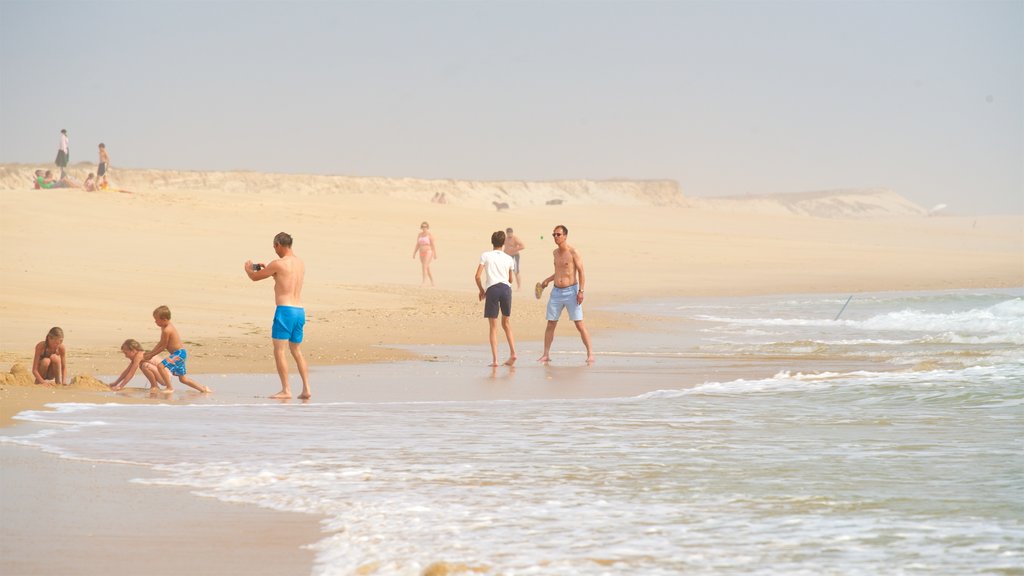 Fuzeta Beach showing general coastal views, a beach and mist or fog