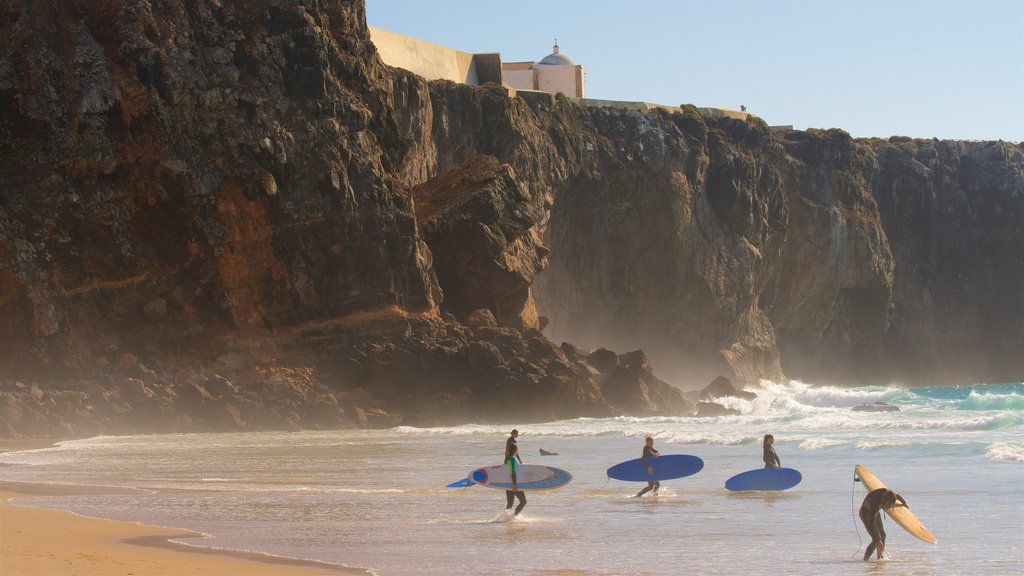 Tonel Beach showing rocky coastline, general coastal views and surfing