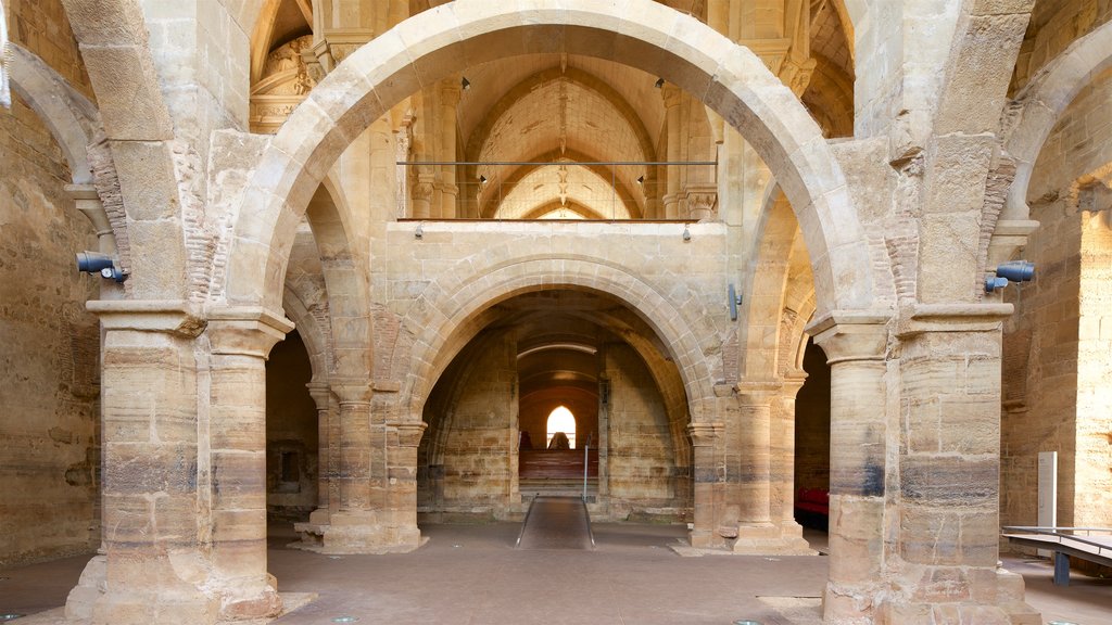 Convento de Santa Clara-a-Velha featuring heritage elements and interior views