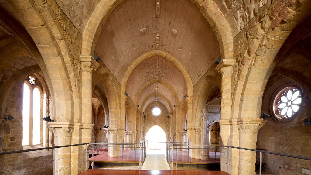 Convento de Santa Clara-a-Velha featuring interior views and heritage elements