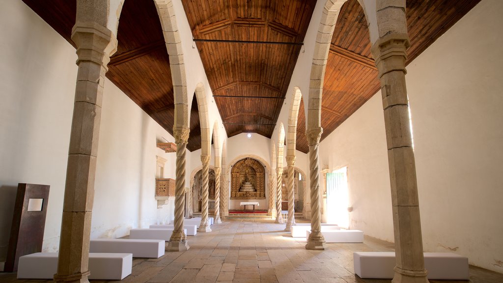 Montemor-o-Velho Castle which includes a church or cathedral and interior views