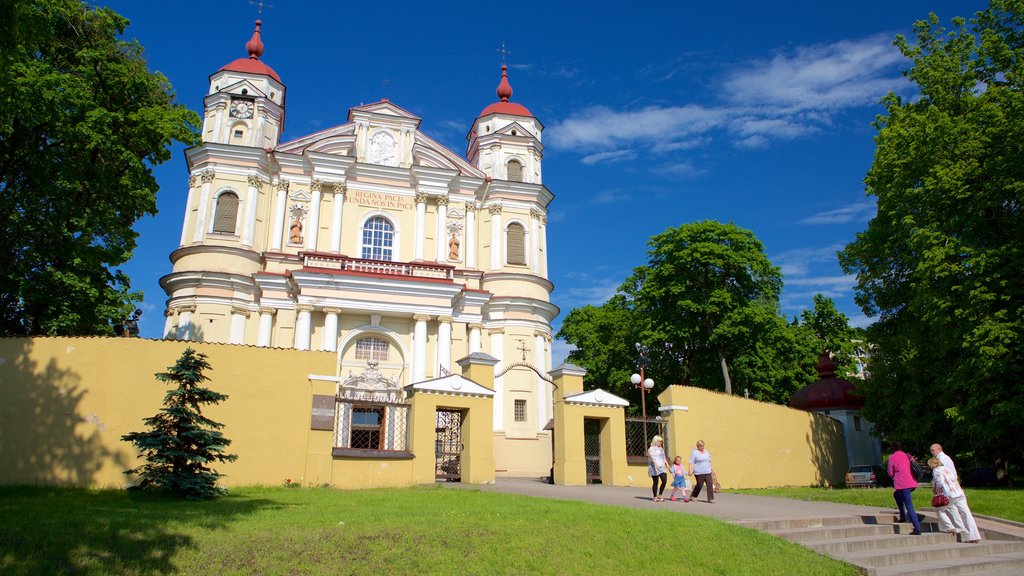 St. Peter and St. Paul\'s Church featuring a church or cathedral and heritage architecture as well as a small group of people