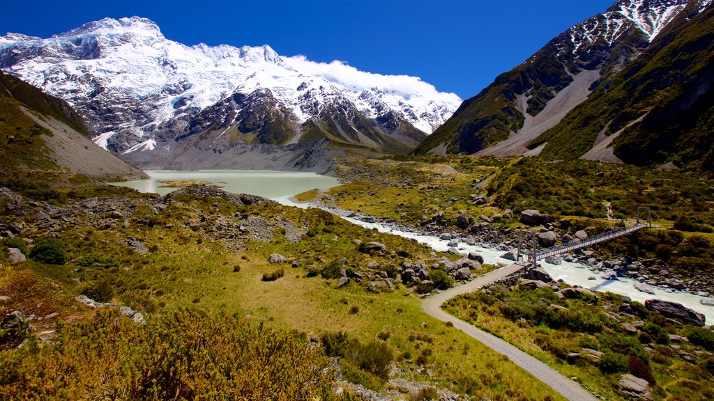 Parque Nacional Mount Cook mostrando escenas tranquilas, nieve y un río o arroyo