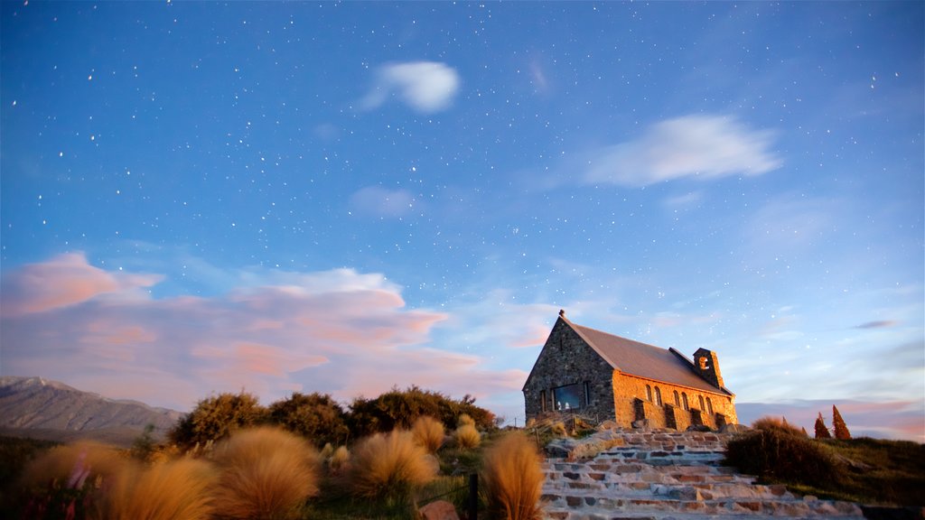 Church of the Good Shepherd featuring a church or cathedral, night scenes and a sunset