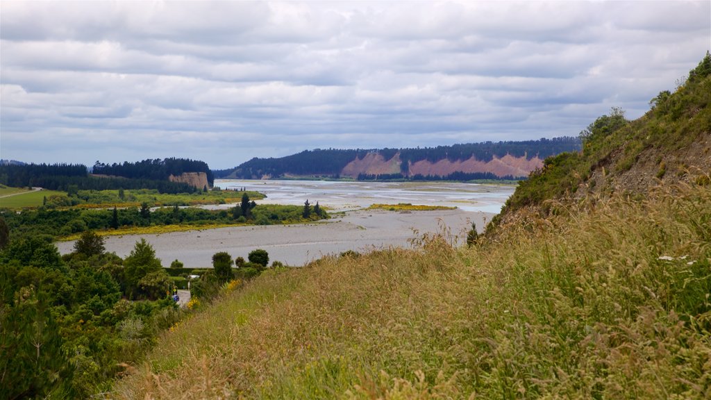 Rakaia Gorge featuring tranquil scenes and a lake or waterhole