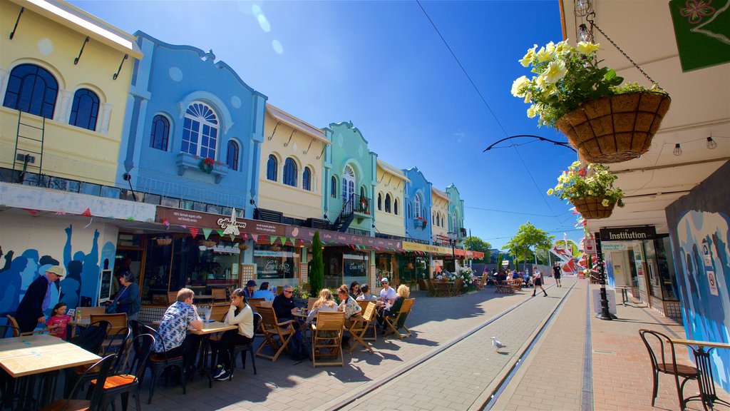 New Regent Street which includes flowers and outdoor eating as well as a small group of people