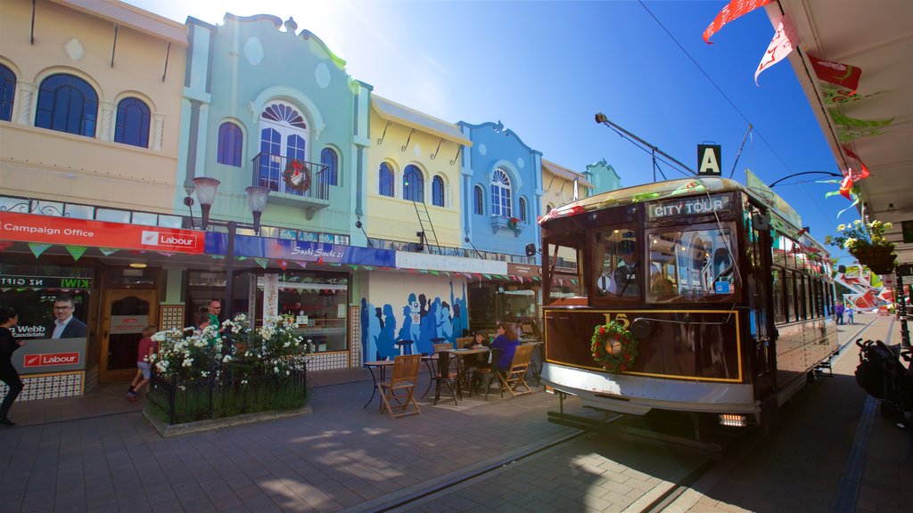 New Regent Street featuring railway items and outdoor eating as well as a small group of people