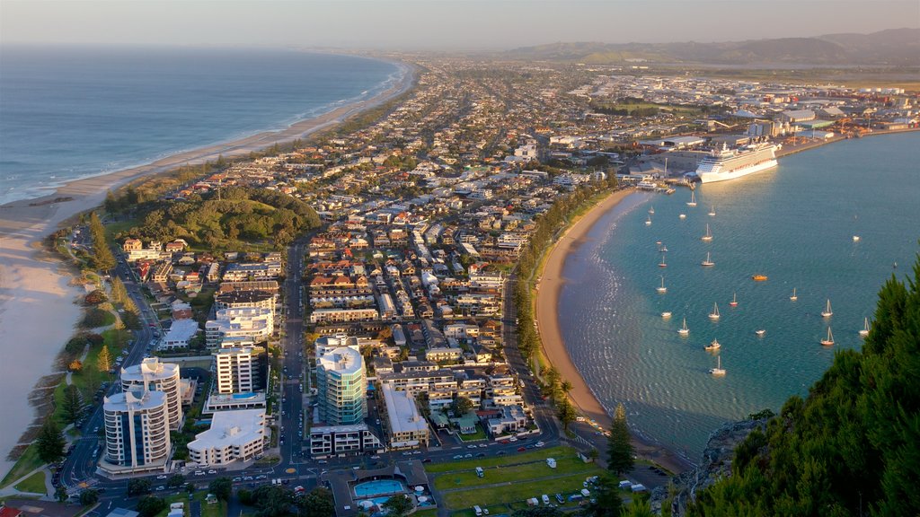 Mount Maunganui which includes a coastal town, a bay or harbor and general coastal views