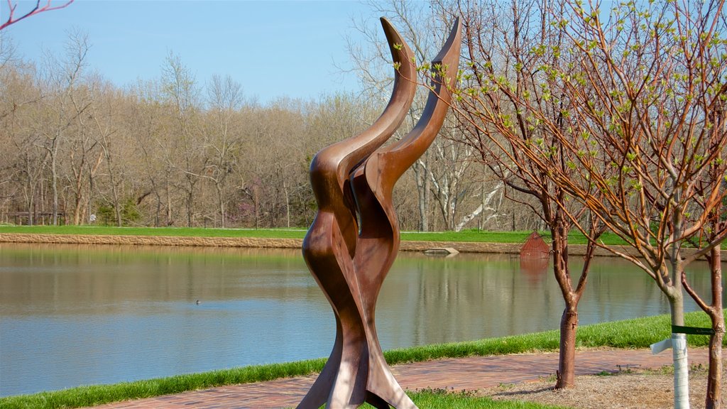 Overland Park Arboretum and Botanical Gardens showing a park and a pond