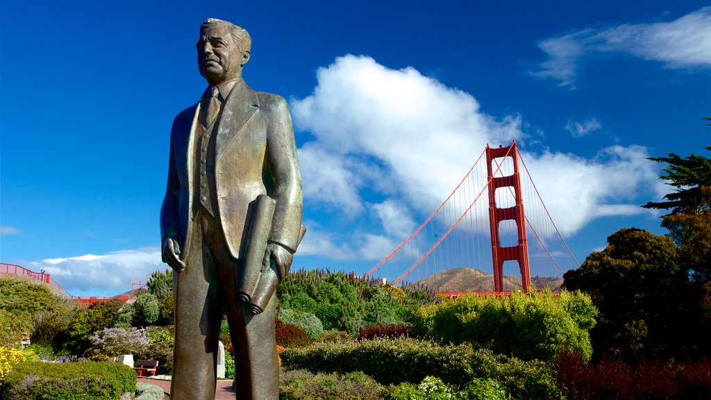 Puente Golden Gate ofreciendo un jardín, una estatua o escultura y un puente