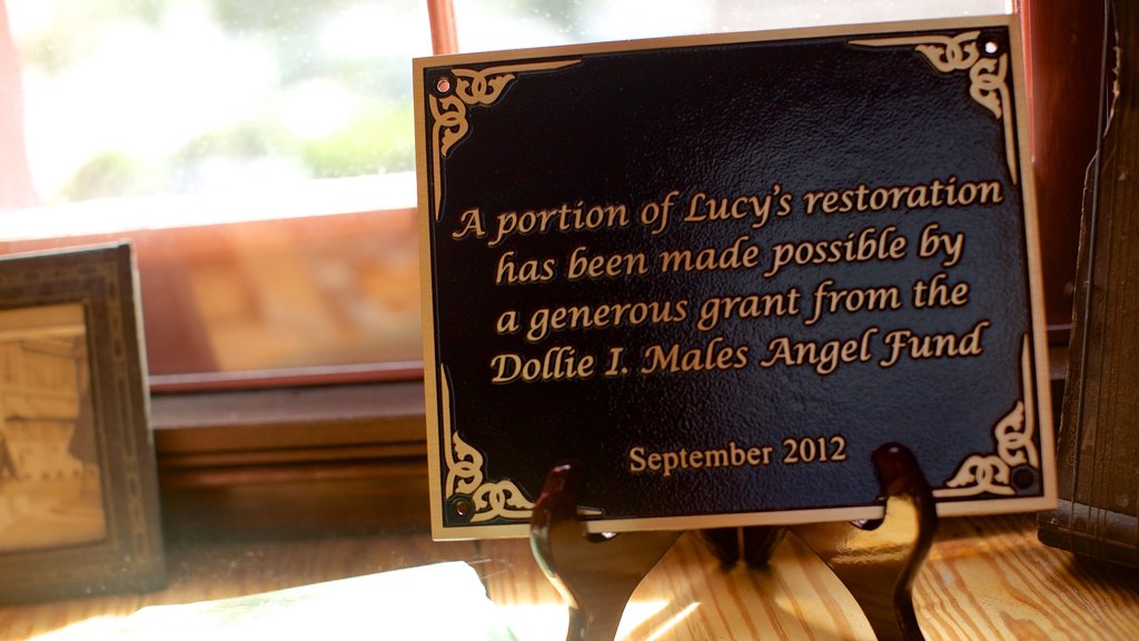 Lucy the Elephant featuring signage and interior views