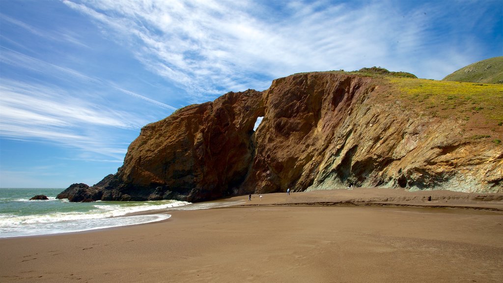 San Francisco showing rugged coastline, a sandy beach and general coastal views