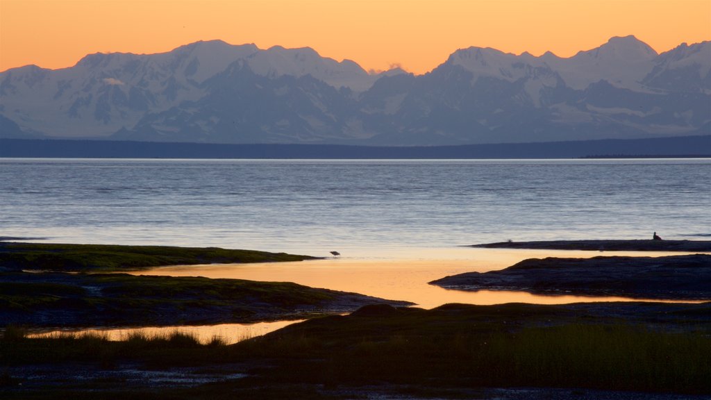 Tony Knowles Coastal Trail showing landscape views, a sunset and a lake or waterhole