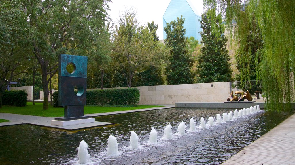 Nasher Sculpture Center featuring a park, a monument and a pond