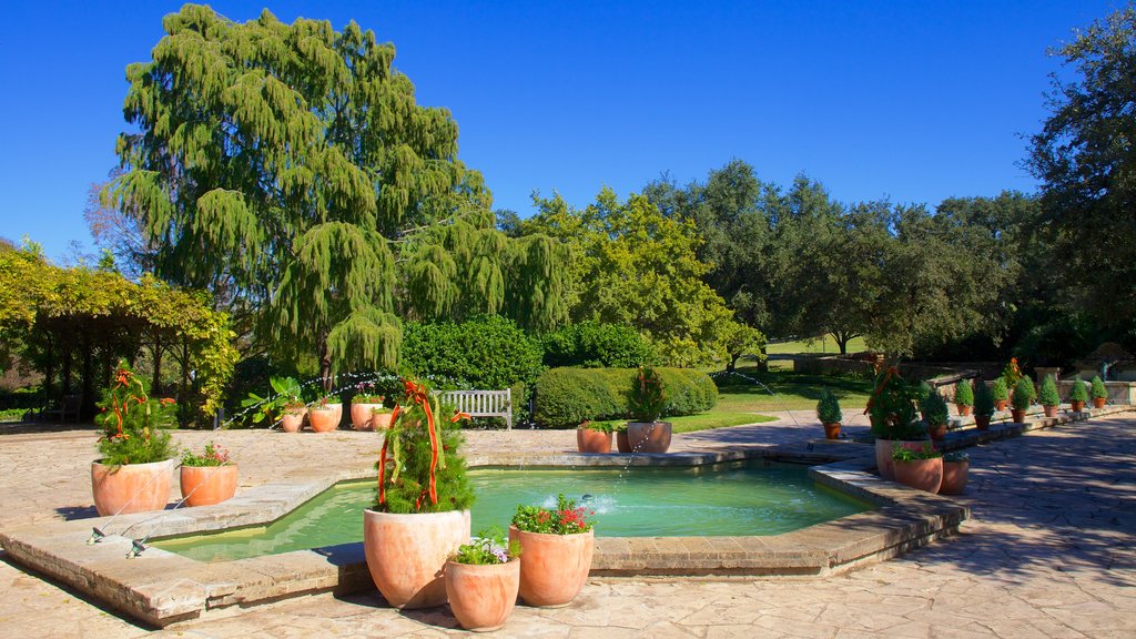 San Antonio Botanical Gardens featuring a lake or waterhole, landscape views and a pond