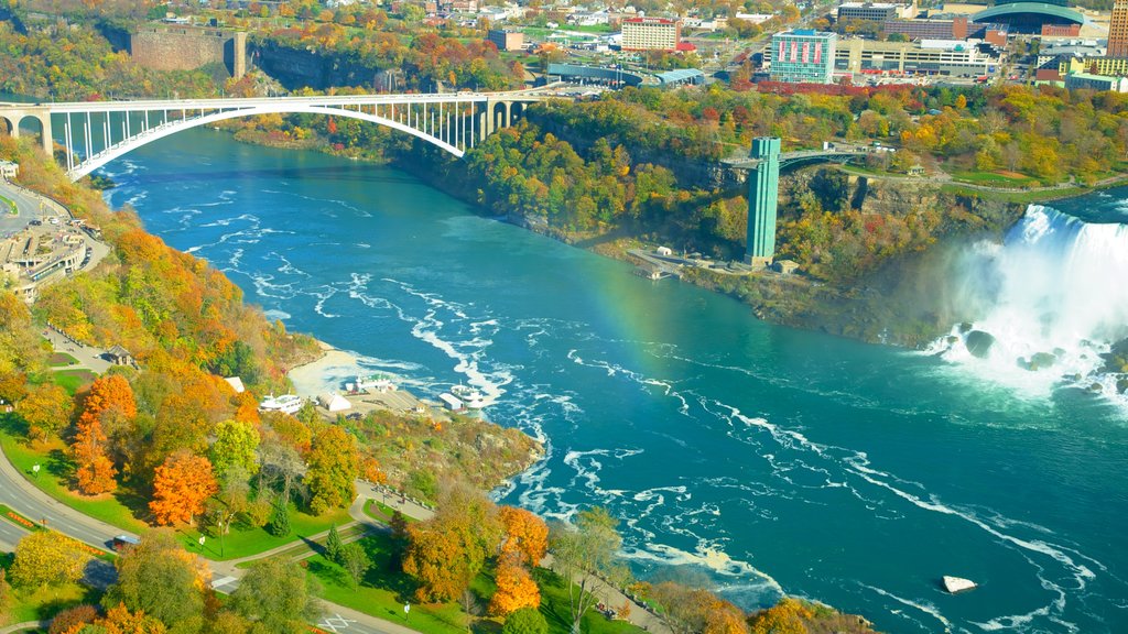 Maid of the Mist showing a bridge, a waterfall and landscape views