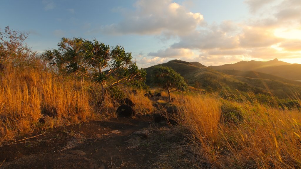 Naviti Island which includes a sunset and landscape views