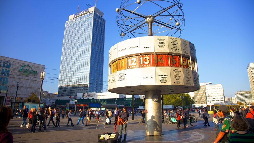 Alexanderplatz showing outdoor art, a skyscraper and a city