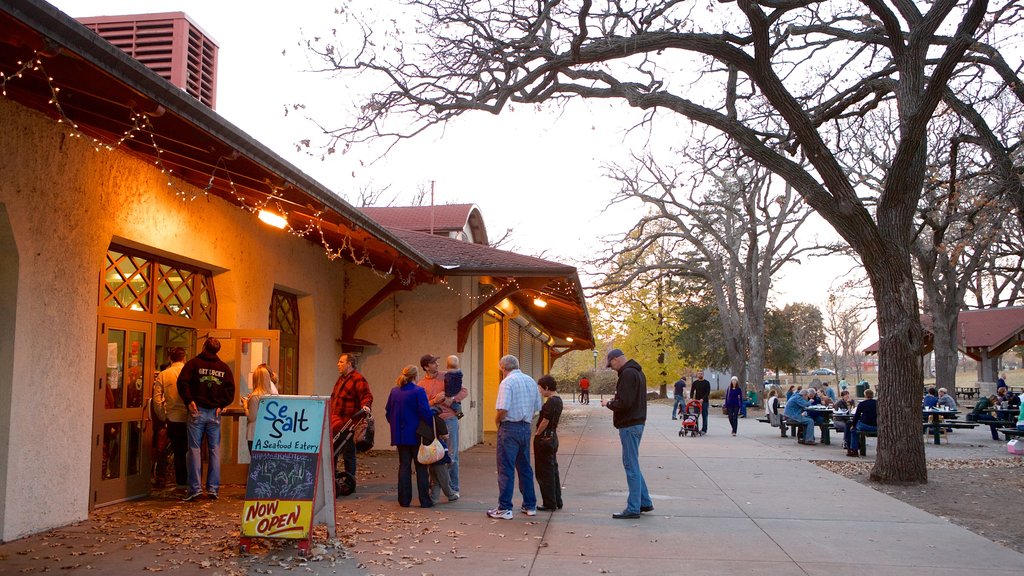 Minnehaha Park which includes signage as well as a small group of people