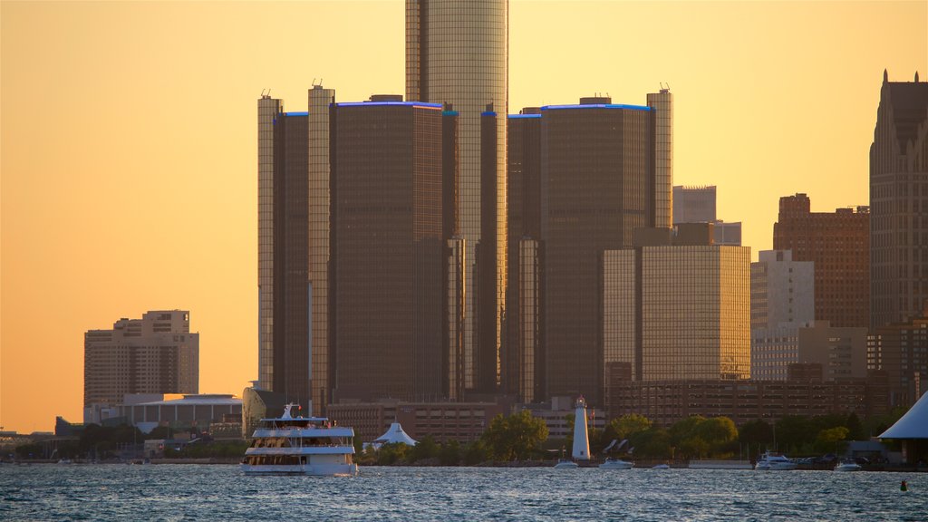 Belle Isle showing a skyscraper, a city and a sunset