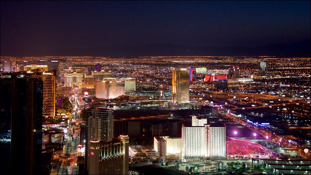 Stratosphere Tower showing night scenes, a city and landscape views