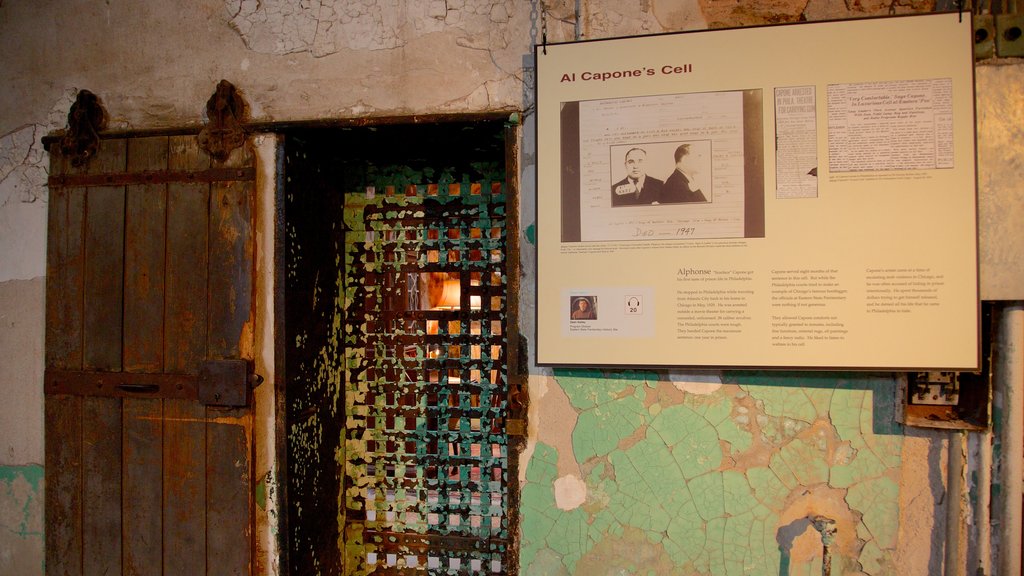 Eastern State Penitentiary showing signage, heritage elements and interior views