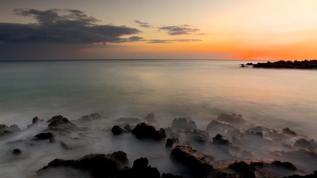 Hapuna Beach State Park showing general coastal views, a sunset and rugged coastline