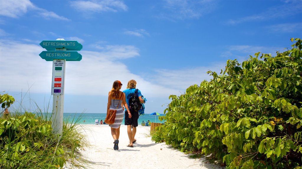 Lido Key which includes a beach and general coastal views as well as a couple