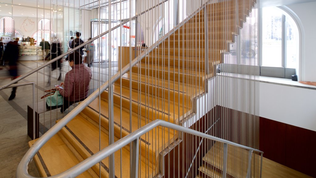 Museum of Arts and Design featuring interior views as well as a small group of people