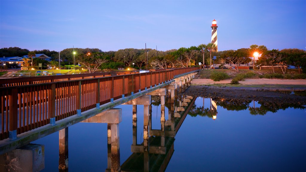 St. Augustine Lighthouse and Museum which includes a river or creek, a bridge and a lighthouse