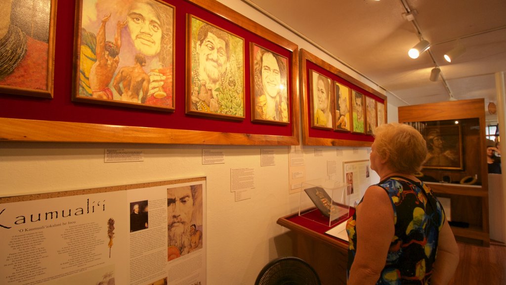 Kauai Museum featuring art and interior views as well as an individual femail